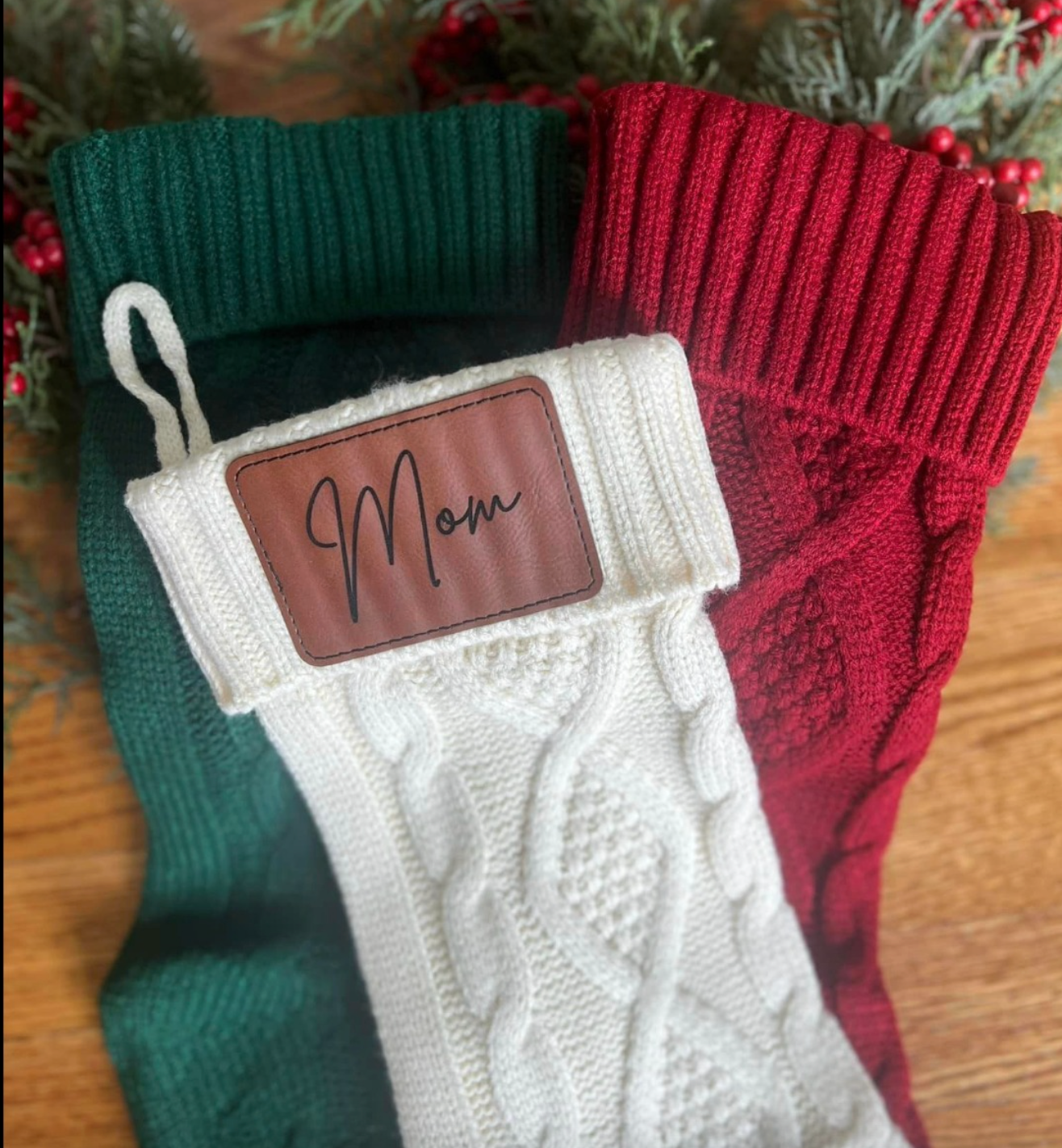 Cable knit stocking with leatherette patch